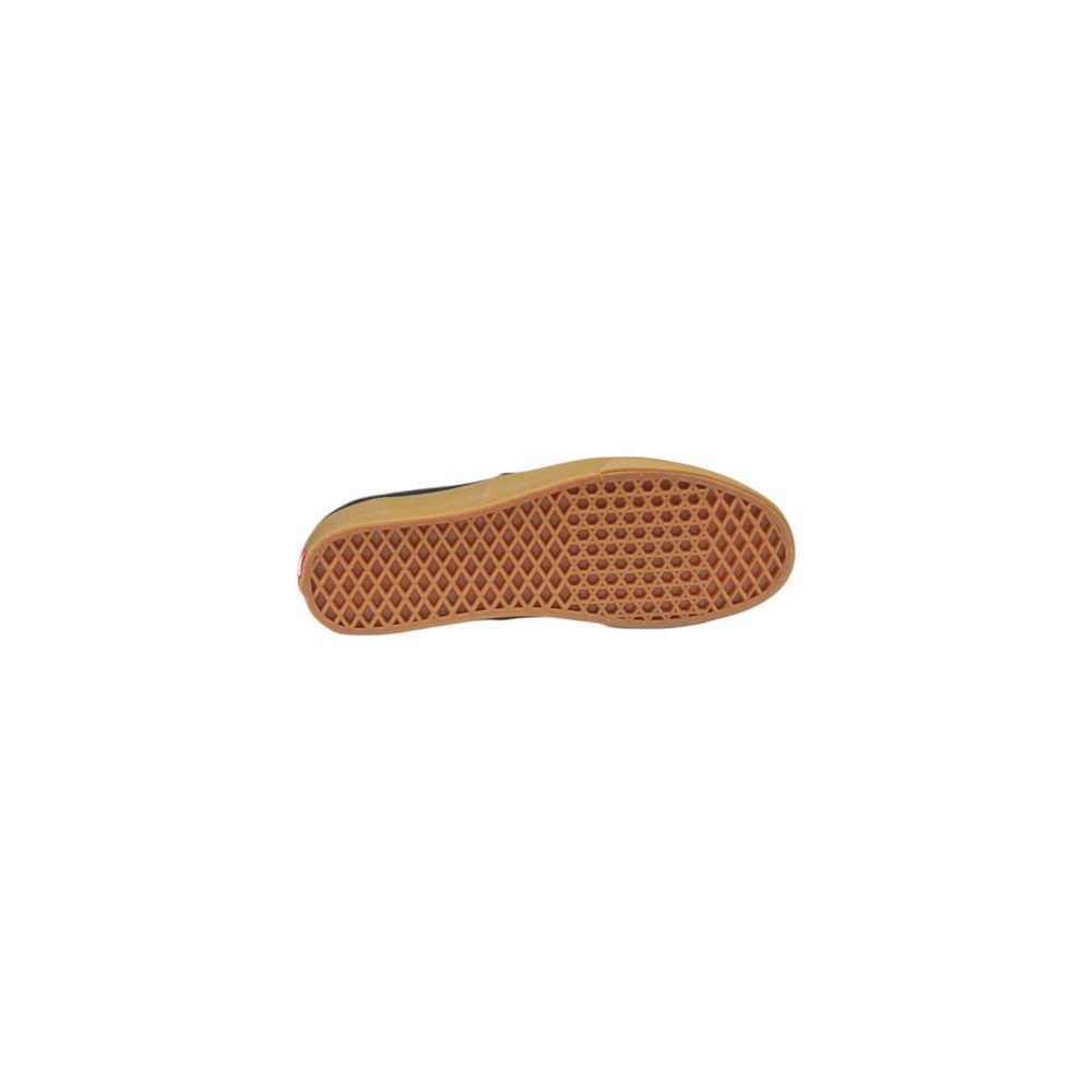 Brown waffle-patterned shoe sole of Vans Black Fabric Sneaker
